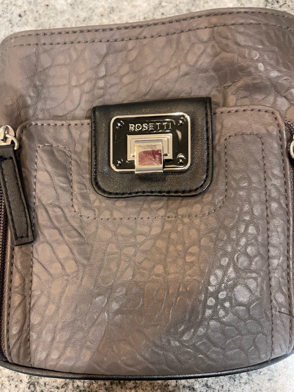 Rosetti Taupe Pebbled Crossbody with Black Trim and Silver Hardware - Picture 2 of 5